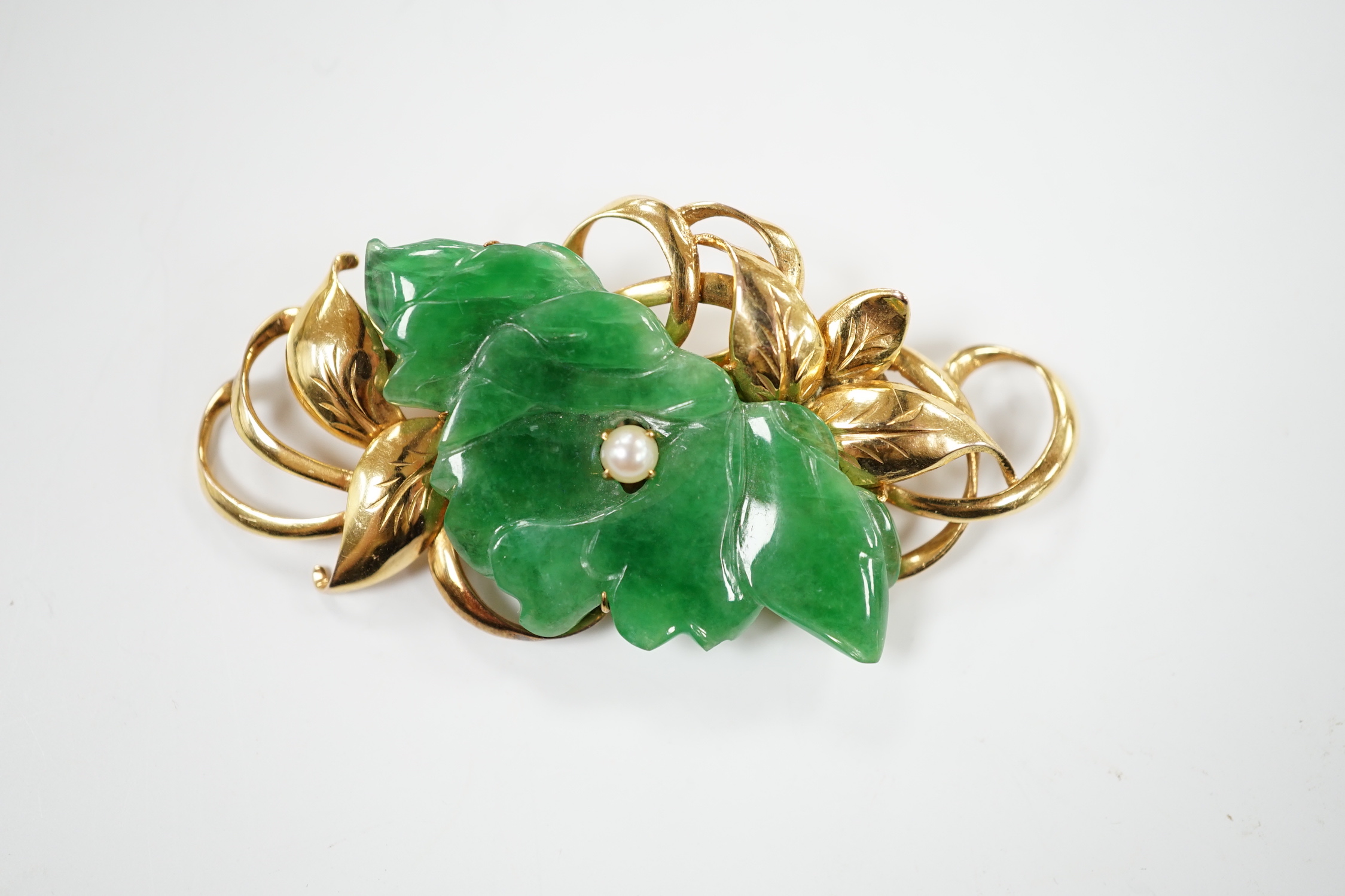 A 14k yellow metal, carved jade and seed pearl mounted floral spray brooch, 57mm